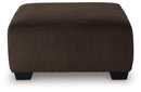 Kimlee - Sectional And Ottoman Set